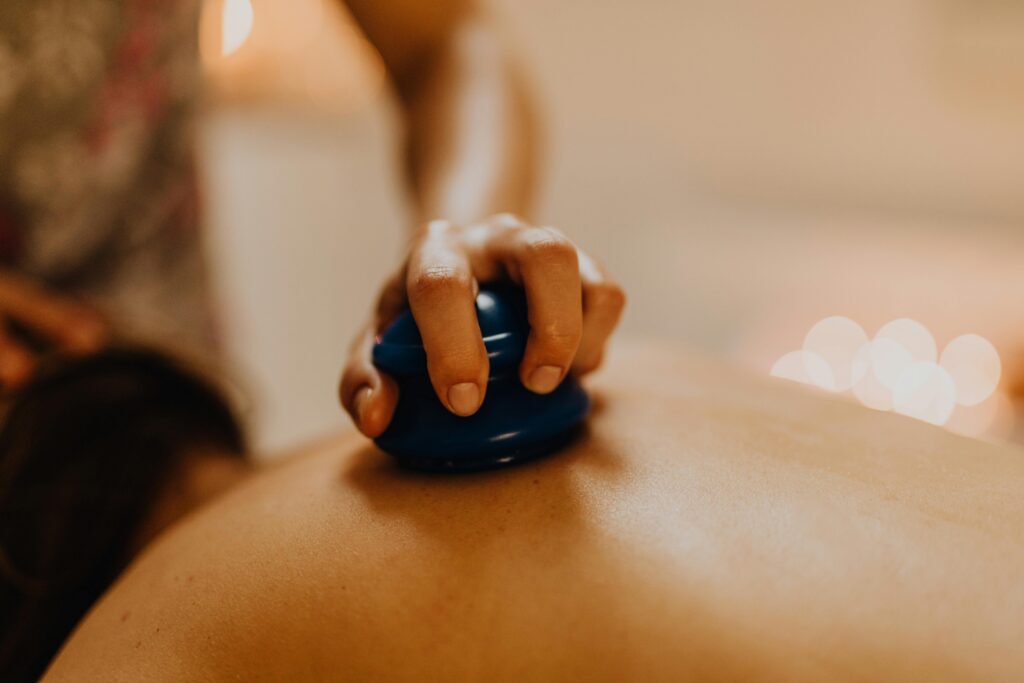 Photo of a client receiving cupping therpay at Durango Massage by Jennifer included with the price