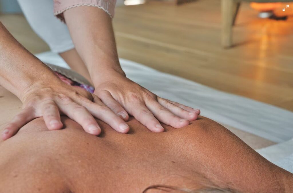 Photo of a person receiving Swedish Flow Massage by Jennifer